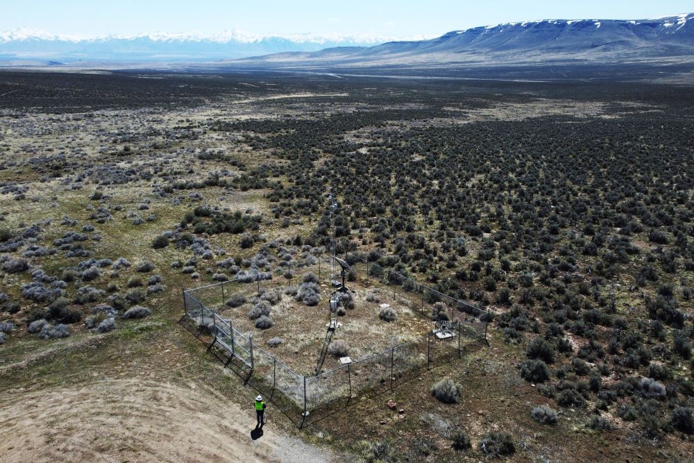 An employee stands near the Lithium Nevada Corp. mine site at Thacker Pass on April 24, 2023, near Orovada, Nev.