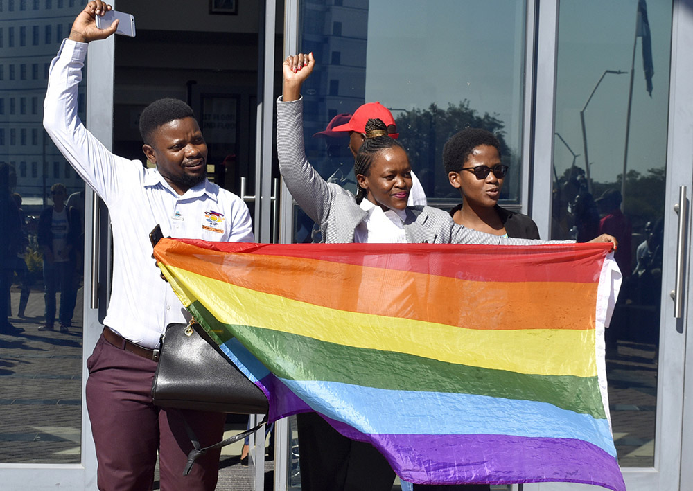 In Gaborone, Botswana, activists celebrate a High Court decision that decriminalized gay sex on June 11, 2019. In response to a December 2023 Vatican document allowing blessings of same-sex couples, the Catholic bishops of Southern Africa, including Botswana, said they would provide a guide on how such a blessing may be requested or granted to avoid confusion on Catholic teaching. (AP Photo, File)
