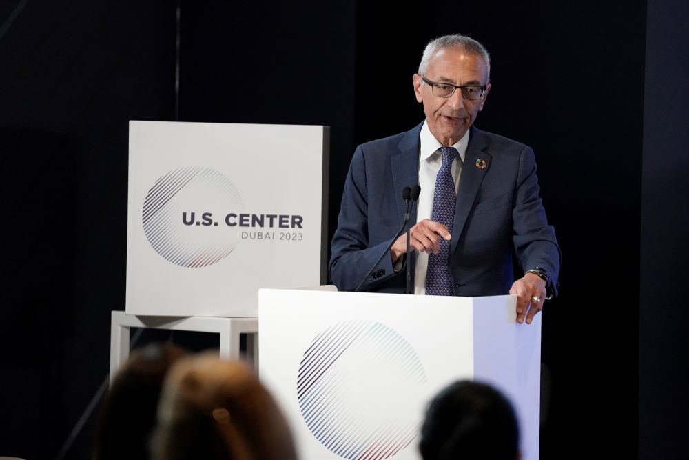 John Podesta, senior adviser to the president for Clean Energy Innovation and Implementation, speaks at the U.S. Center at the COP28 U.N. Climate Summit on Dec. 2 in Dubai, United Arab Emirates.