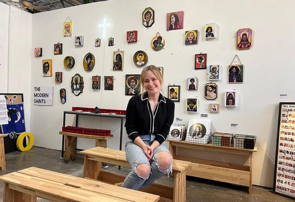 Gracie Morbitzer, artist and editor behind the new book "Modern Saints: Portraits and Reflections on the Saints," poses in her studio. 