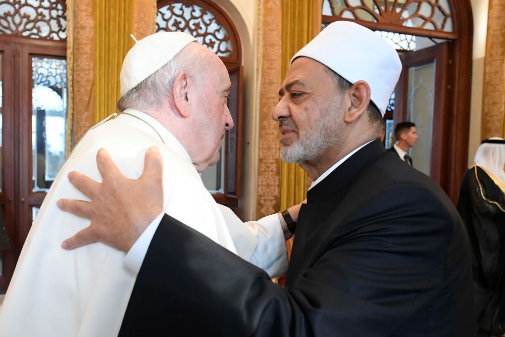 Pope Francis greets Egypt's Grand Imam Ahmad al-Tayebat Sakhir Palace in Awali, Bahrain, on Nov. 4, 2022. Tayeb has endorsed "Al-Mizan: A Covenant for the Earth," which calls on the world's Muslims to take steps to mitigate climate change. (CNS/Vatican Media)