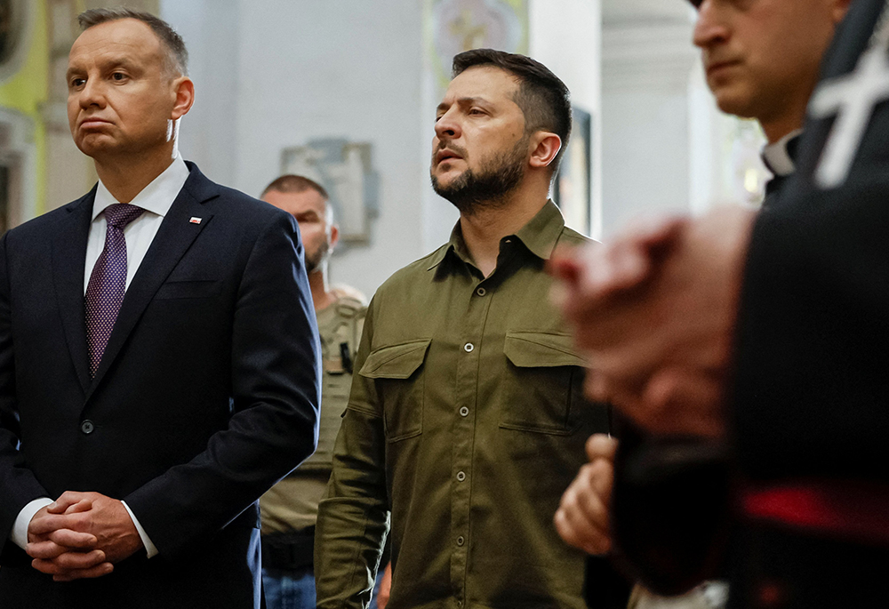 Polish President Andrzej Duda and Ukrainian President Volodymyr Zelenskyy attend a service to commemorate victims of World War II Valhynia Slaughter at St. Peter and Paul Cathedral July 9, 2023, in Lutsk, Ukraine. (OSV News/Reuters/Alina Smutko)
