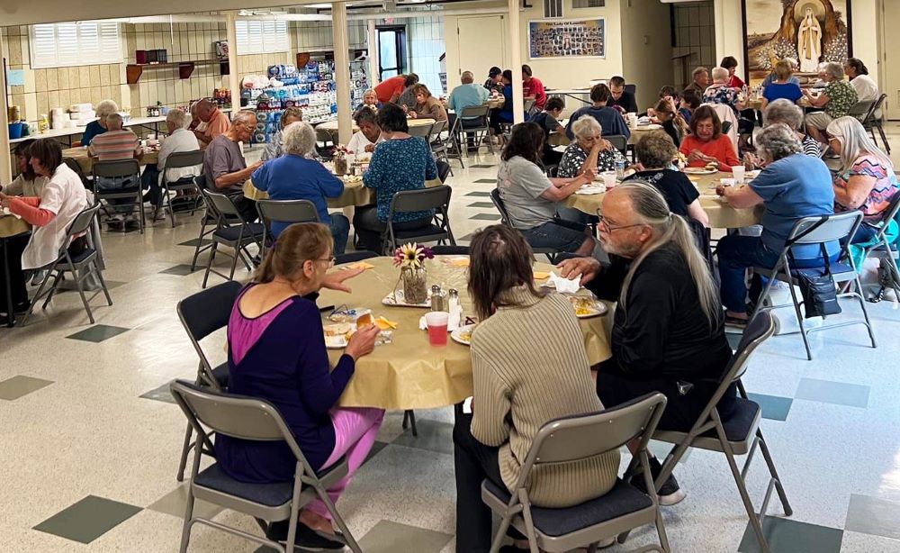 In this undated photo, parishioners from Our Lady of Lourdes and St. Jude in Columbiana, Ohio provide a community meal to those living in the East Palestine area, the scene of a toxic train derailment in February 2023 that continues to impact the wider area. (OSV News photo/courtesy Father Chad Johnson)