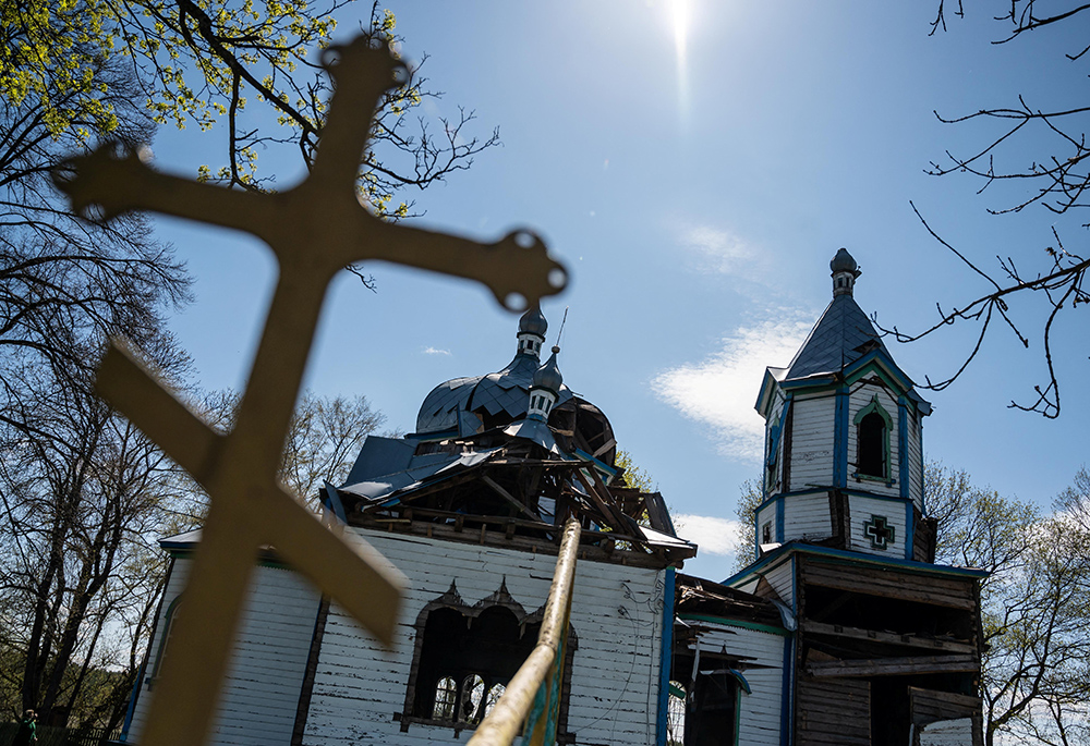 A view of a 19th-century wooden church, damaged by a rocket attack during the Russian invasion of the Zhytomyr region of Ukraine April 28, 2022. (OSV News/Reuters/Viacheslav Ratynskyi)