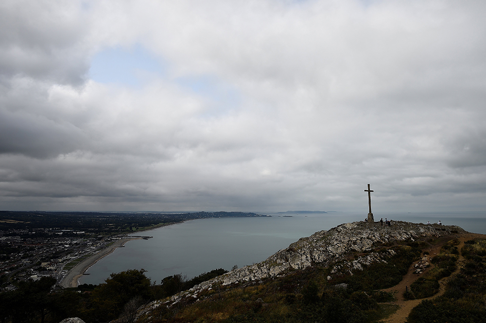 A huge cross is seen overlooking the Eastern Irish coastline of Counties Wicklow and Dublin in Bray, Ireland, Aug. 19, 2018. (OSV News/Reuters/Clodagh Kilcoyne)