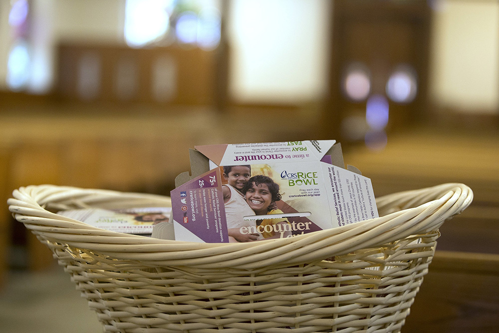 Envelopes for Catholic Relief Services' Rice Bowl program are displayed in this illustration file photo. CRS is the overseas relief and development agency of the Catholic Church in the U.S. (OSV News/Octavio Duran)