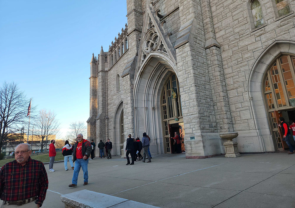 Catholics depart Our Lady of Perpetual Help Parish, in midtown Kansas City, Missouri, after 7 a.m. Mass on Ash Wednesday, Feb. 14. (NCR photo/Brian Roewe)
