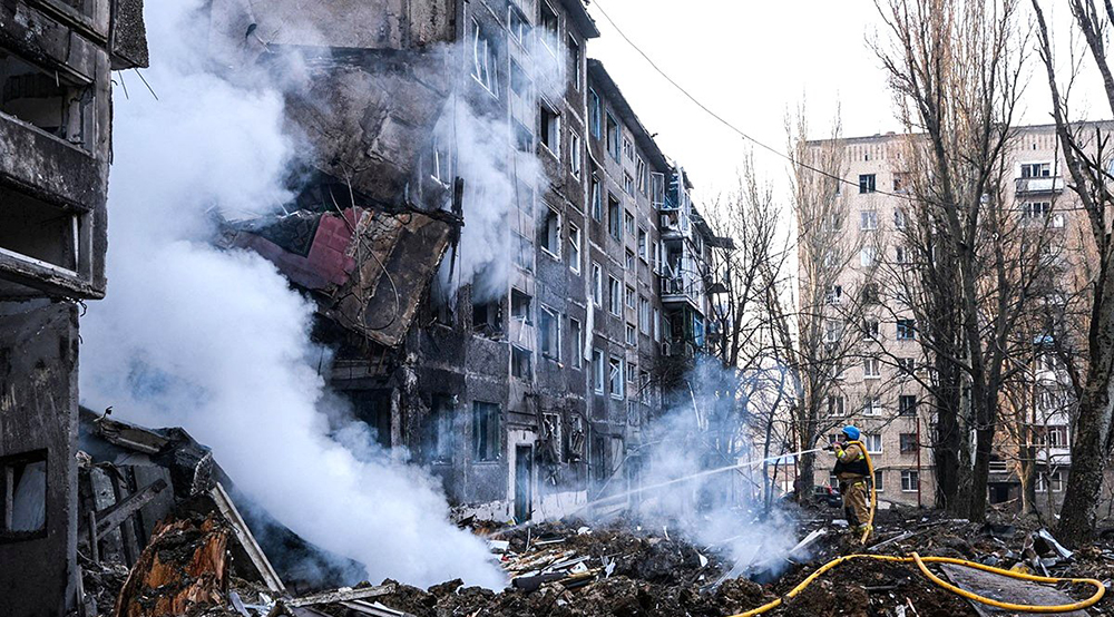A firefighter works at the site of a residential building in Selydove, in Ukraine's Donetsk region, that was destroyed in a Russian missile attack Feb. 14, 2024. (OSV News/National Police handout via Reuters)