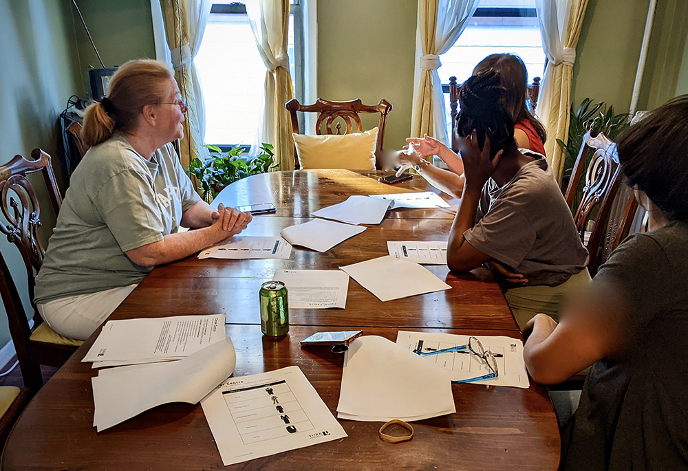 LifeWay Network volunteer Marianne Lannig provides a financial literacy workshop for human trafficking survivors. (Courtesy of LifeWay Network)