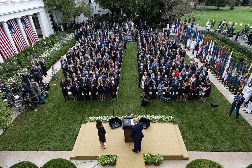 On Sept. 26, 2020, in the Rose Garden at the White House in Washington, President Donald Trump arrives with Judge Amy Coney Barrett for a news conference to announce Barrett as his nominee to the Supreme Court. (AP/Alex Brandon)