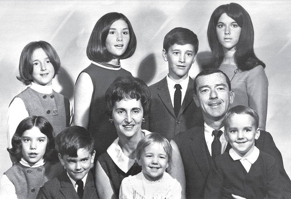 Meg Kissinger is pictured in a family portrait, far left in the top row. Kissinger, for many years a Milwaukee Journal Sentinel investigative journalist, has written the memoir While You Were Out: An Intimate Family Portrait of Mental Illness in an Era of Silence. (Courtesy of Meg Kissinger)