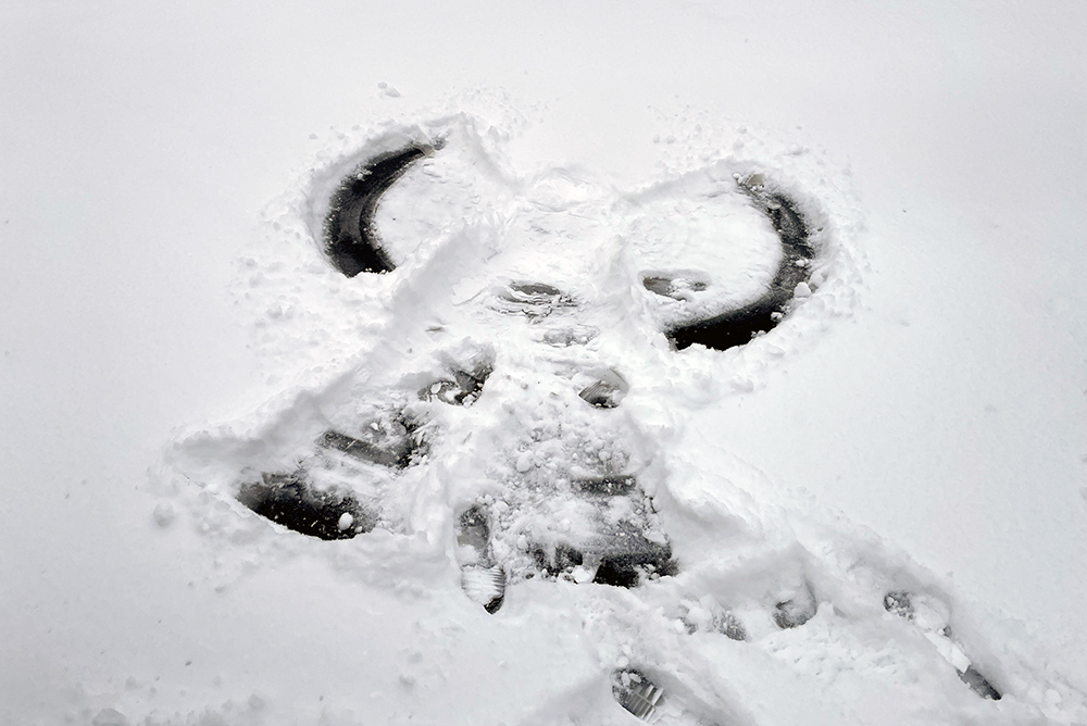 A snow angel made by John Dougherty and his son while playing in their yard on a snow day in January 2024 (John Dougherty)