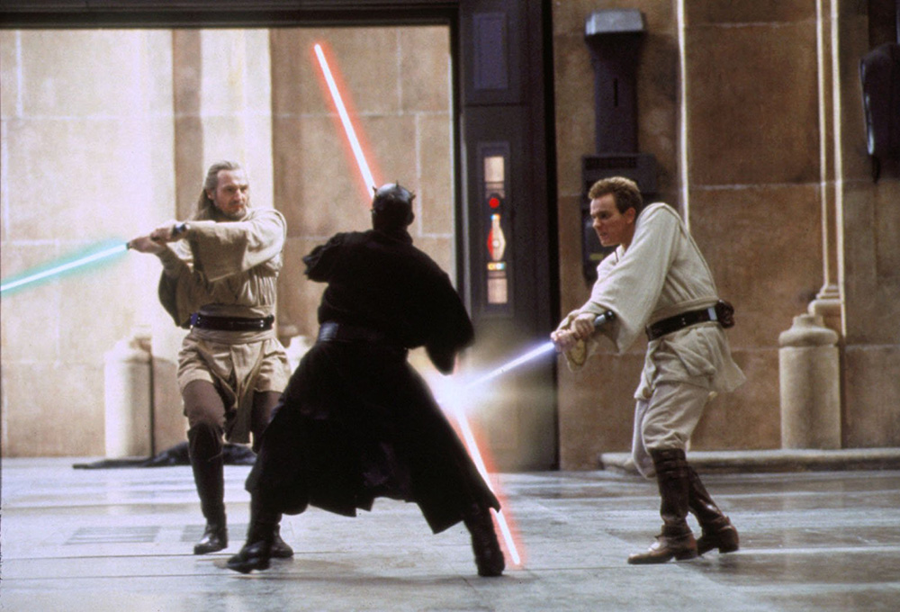 Jedi Qui-Gon Jinn (Liam Neeson), left, and his apprentice Obi-Wan Kenobi (Ewan McGregor) take on Sith Lord Darth Maul (Ray Park) in ''Star Wars: Episode I — The Phantom Menace.'' (CNS/Lucasfilm)
