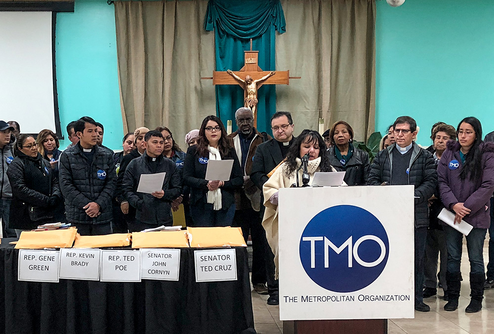 On Jan. 18, 2018, recipients of the Deferred Action for Childhood Arrivals program and their supporters, including clergy, participate in a news conference sponsored by The Metropolitan Organization at St. Leo the Great Catholic Church in Aldine, Texas. They gathered thousands of postcards to be mailed to congressional members urging they keep the DACA program intact. (CNS/Courtesy of TMO)