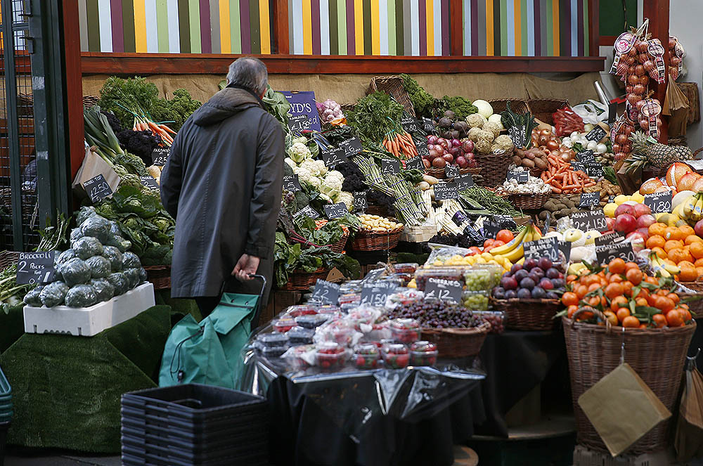 A shopper browses at a vegetable market in London Feb. 3, 2017. (CNS/Reuters/Peter Nicholls)