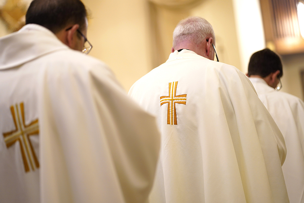 Priests are seen during a special Mass for vocations at Curé of Ars Church in Merrick, New York, Aug. 4, 2022, the feast of St. John Vianney, patron of parish priests. (CNS/Gregory A. Shemitz)
