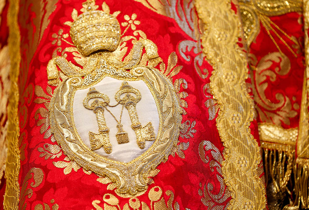 A detail of vestments decorating a statue of St. Peter, as is customary on the saint's feast day, is seen during a Mass for the feast of Sts. Peter and Paul celebrated by Pope Francis in St. Peter's Basilica at the Vatican June 29, 2023. (CNS/Lola Gomez)