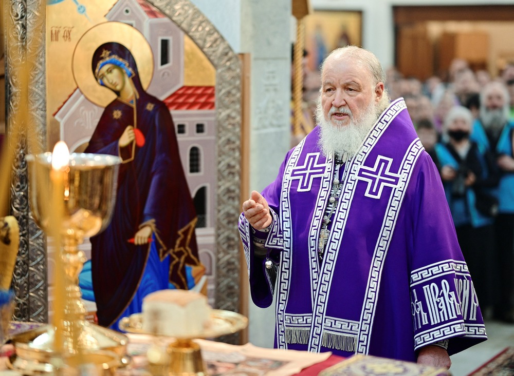 Russian Patriarch Krill, vested before Eucharistic elements on altar. 