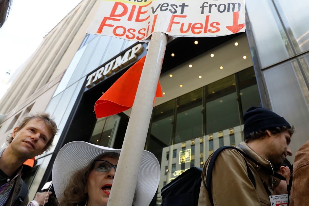 Protesters gather for a fossil fuel and climate change protest outside Trump Tower in New York City on May 9, 2017. 