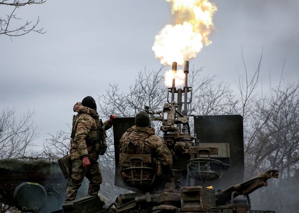 Ukrainian servicemen from the air defense unit of the 93rd Mechanized Brigade fire an anti-aircraft cannon from a front-line position near the town of Bakhmut on March 6, amid Russia's attack on Ukraine. 