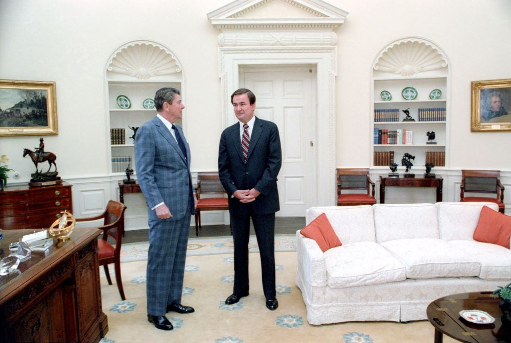 Then-President Ronald Reagan meets with Pat Buchanan in the Oval Office in March 1982.