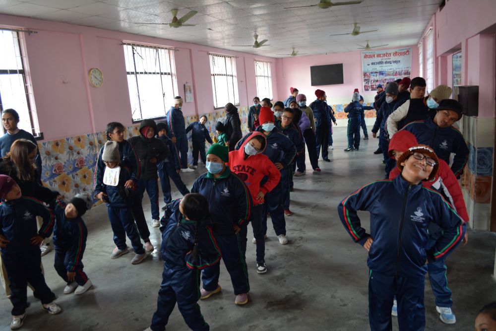 Students of the Navjyoti Centre in Kathmandu, Nepal, participate in the day care school's morning assembly.