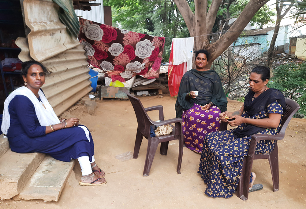 Transgender women who are members of Kovai Meera's group sit in front of their rented accommodation on the outskirts of Tamil Nadu state in southern India. (Saji Thomas)