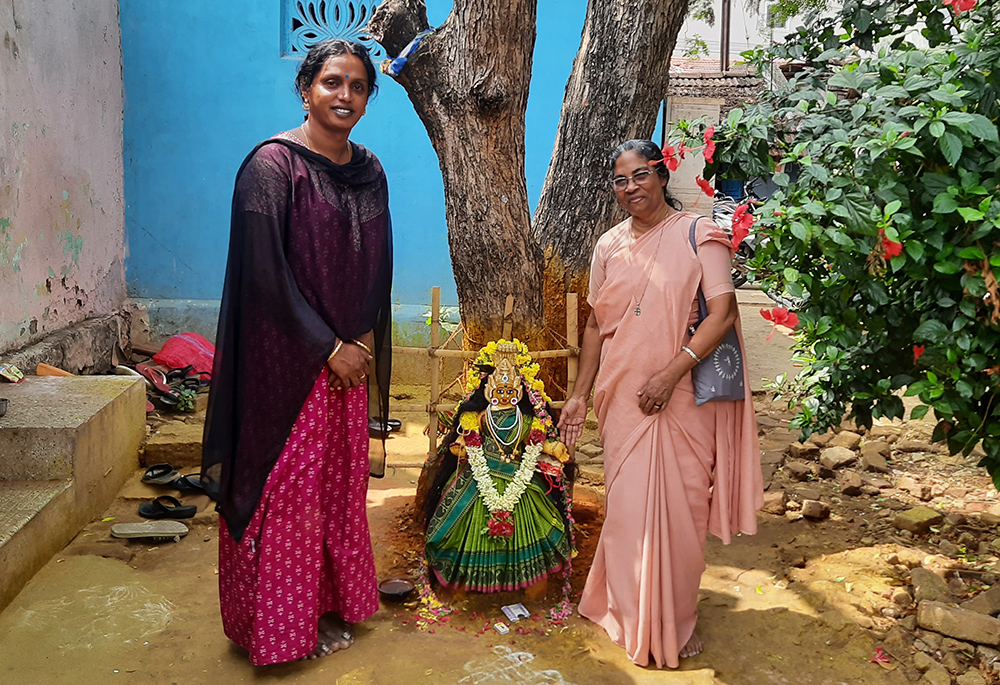 Sr. Stella Baltazar with Kovai Meera, near the deity of trans women in her residence on the outskirts of Coimbatore, Tamil Nadu state in southern India. They worship this deity as they do not follow other religions. (Saji Thomas)