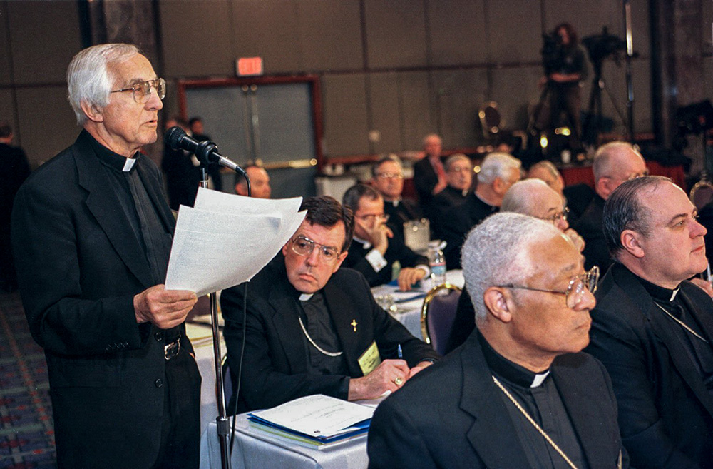 Detroit Auxiliary Bishop Thomas Gumbleton addresses the U.S. bishops about the situation in Iraq at the start of their annual fall meeting Nov. 10, 1997, in Washington. Gumbleton had visited Iraq in early September on a humanitarian mission. (CNS/Nancy Wiechec)