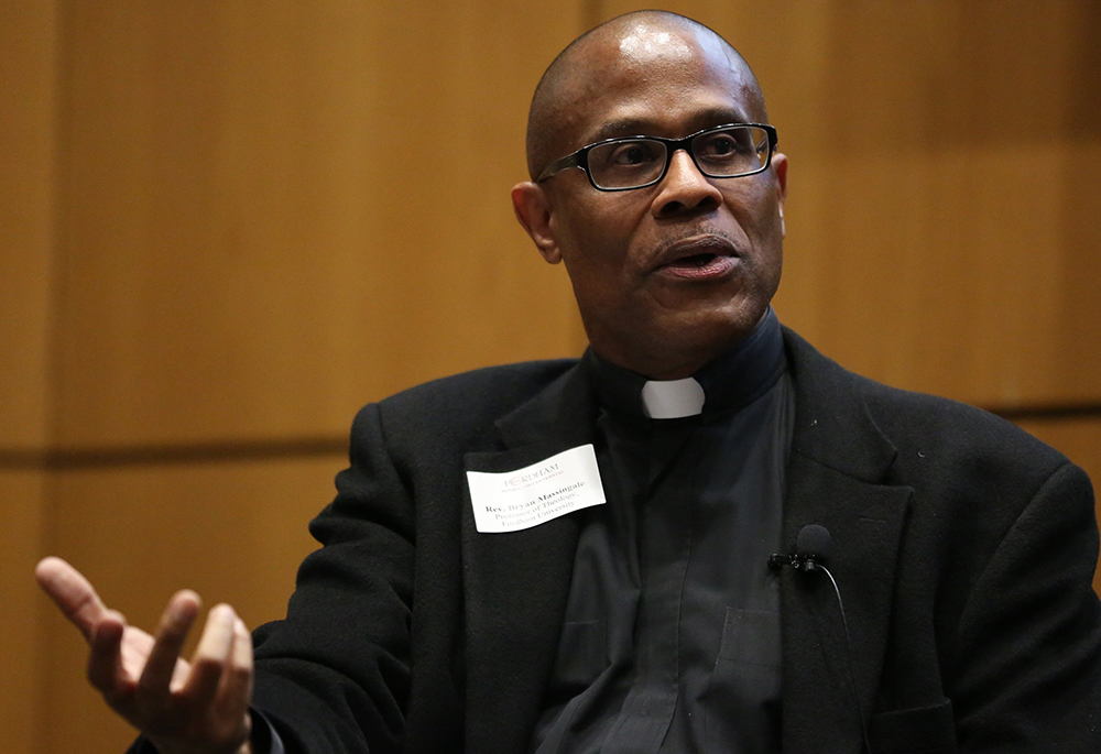 Fr. Bryan Massingale, a theology professor at Fordham University in New York City, is seen during a 2017 panel discussion in New York. (CNS/Fordham University/Bruce Gilbert)