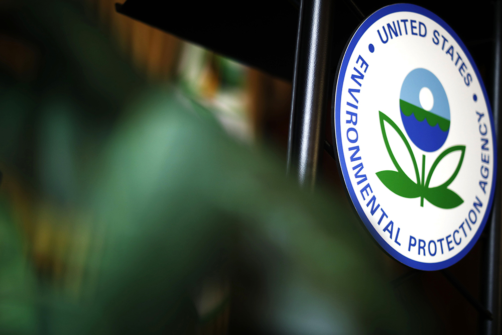 The U.S. Environmental Protection Agency's sign is seen on the podium at EPA headquarters in Washington July 11, 2018. (OSV News/Reuters//Ting Shen)