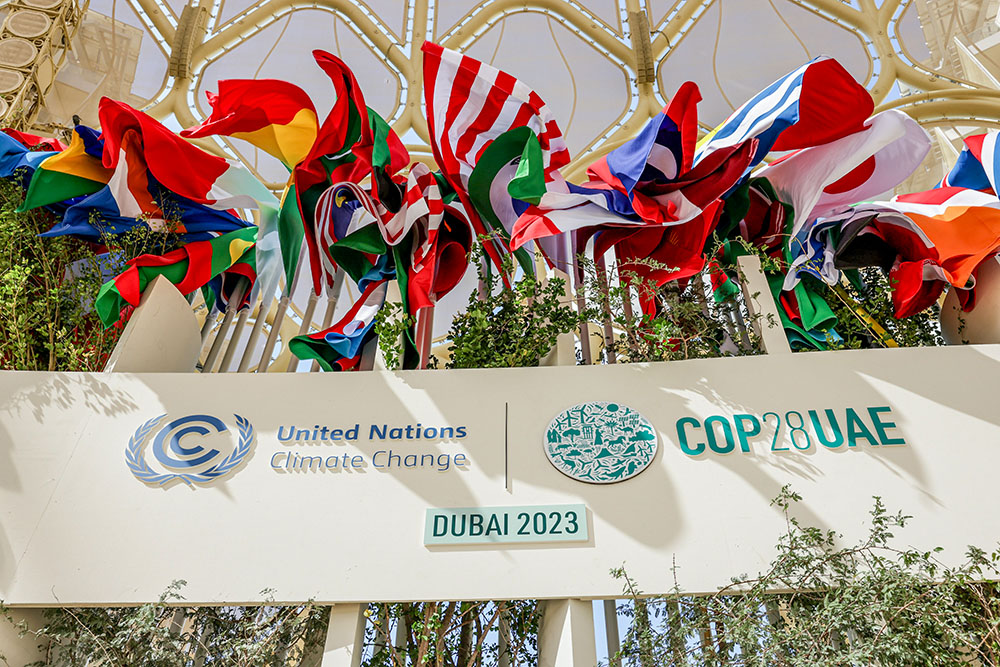 Flags can be seen inside the dome during COP28, the U.N. Climate Change Conference, at Expo City Dubai Nov. 30, 2023, in Dubai, United Arab Emirates. (CNS/Courtesy of UN Climate Change COP28/Christophe Viseux)