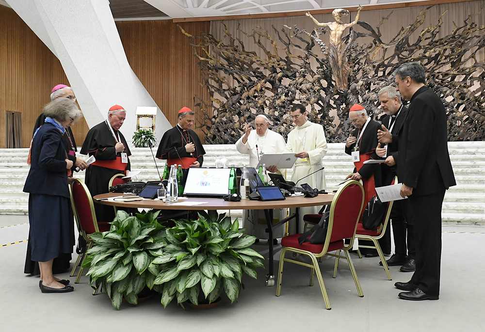 Pope Francis gives his blessing at the conclusion of the assembly of the Synod of Bishops' last working session Oct. 28, 2023, in the Paul VI Hall at the Vatican. (CNS/Vatican Media)