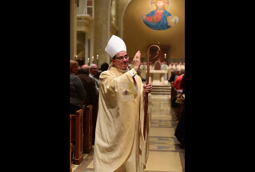 Bishop Power's response to Archbishop Vigano. Bishop Power, vested with crozier, blesses assembly.