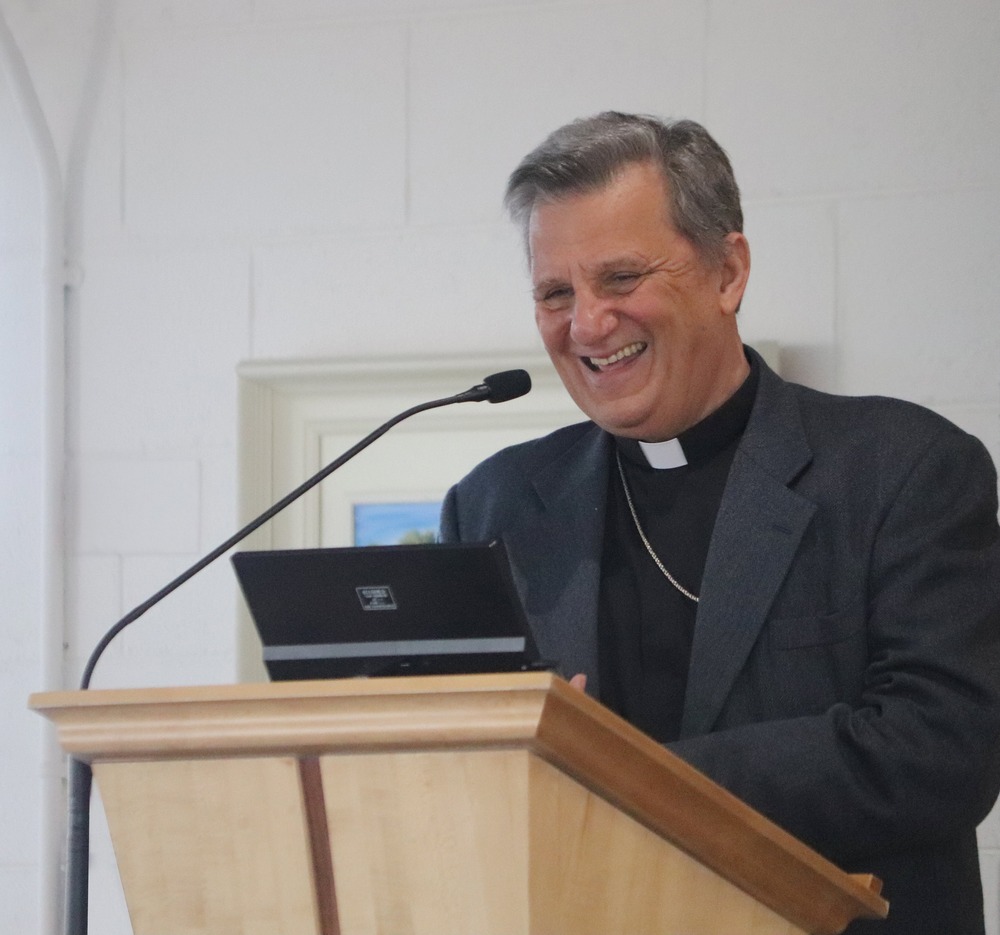 Knock Synodality Conference. Cardinal Grech stands at lectern.
