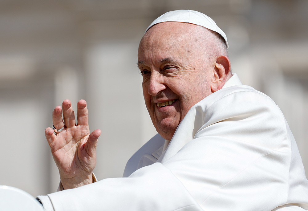 Pope Francis greets people as he rides the popemobile around St. Peter's Square at the Vatican April 25. Francis sent a brief letter to Drachma Parents April 30, responding to their criticism of a Vatican document that condemned gender theory and gender-affirming surgeries. Their original letter to Francis was dated April 23. (CNS/Lola Gomez)