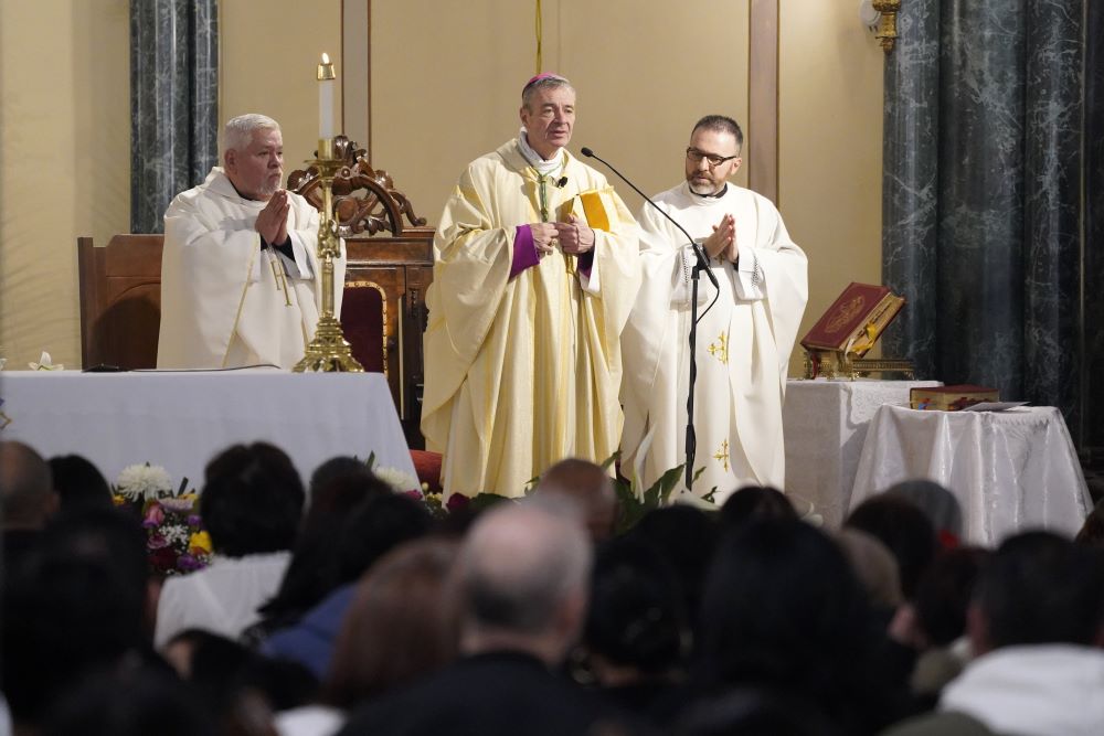 Brooklyn Bishop Robert Brennan addresses the congregation during Divine Mercy Sunday Mass at All Saints Church in the East Williamsburg section of Brooklyn April 7. 