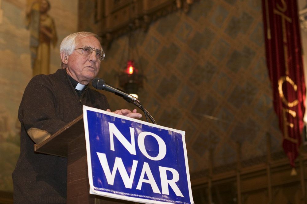 Detroit Auxiliary Bishop Thomas Gumbleton addresses several hundred antiwar activists at Central United Methodist Church in Detroit March 18, at an event marking the second anniversary of the U.S. invasion of Iraq. 