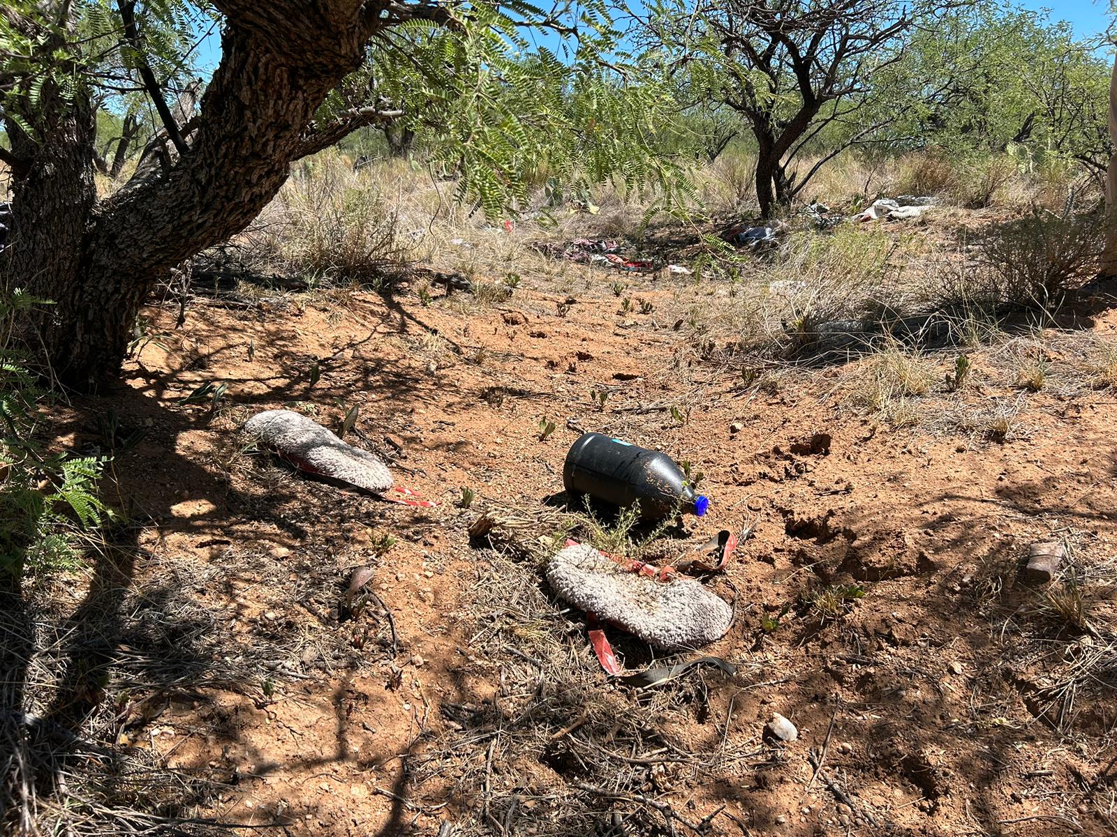 Objects left behind, such as empty water bottles, serve as evidence of the passage of many people — originating from Mexico —- across the Arizona desert in search of a better life in the U.S. (Peter Tran) 