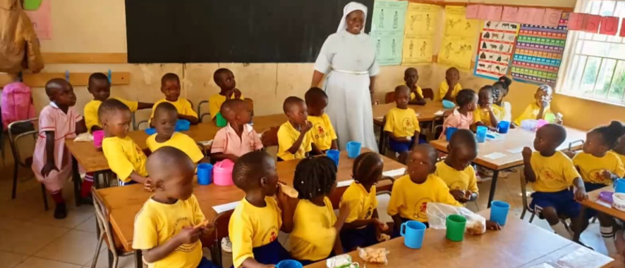 A class in Uganda includes children of human-trafficking survivors, who are successfully reentering society with the help of the St. Monica's Girls' Tailoring Center in Uganda. (Courtesy of Catholic Sisters Initiative)