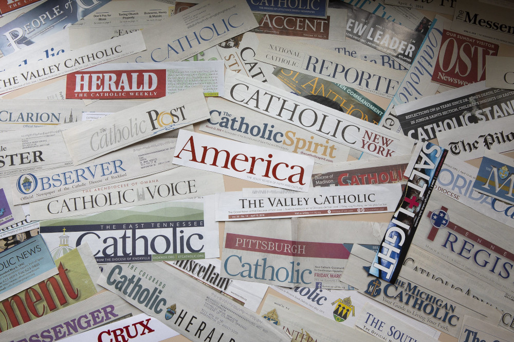 The mastheads of numerous Catholic newspapers are seen in this photo illustration. (CNS photo/Tyler Orsburn)