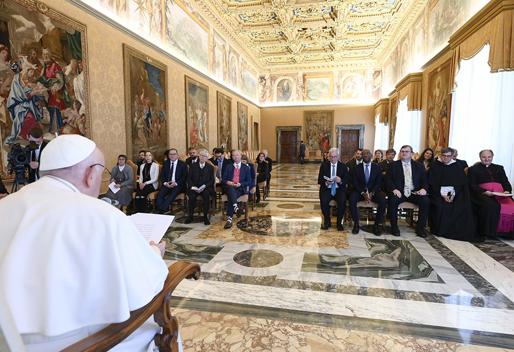 Pope Francis addresses leaders from the tech industry March 27, 2023, at the Vatican. The pope called for an "ethical and responsible" development of artificial intelligence. (CNS/Vatican Media)