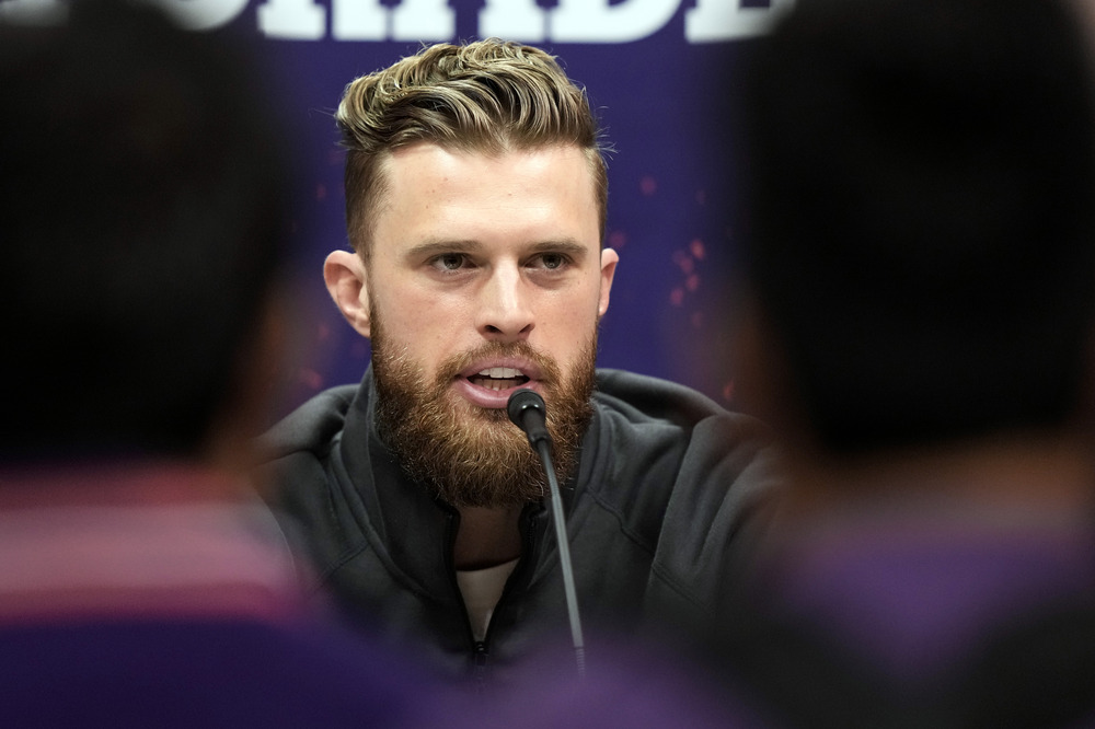 Chiefs kicker Harrison Butker rails against Pride month, Biden in speech at Catholic college Butker pictured speaking into a microphone as part of a panel.