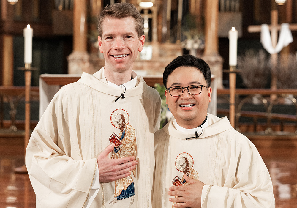 Paulists Fr. Chris Lawton and Fr. Dan Macalinao are pictured after their ordination Mass, at St. Paul The Apostle Church on May 18 in New York City. (Courtesy of Zachera Wollenberg)