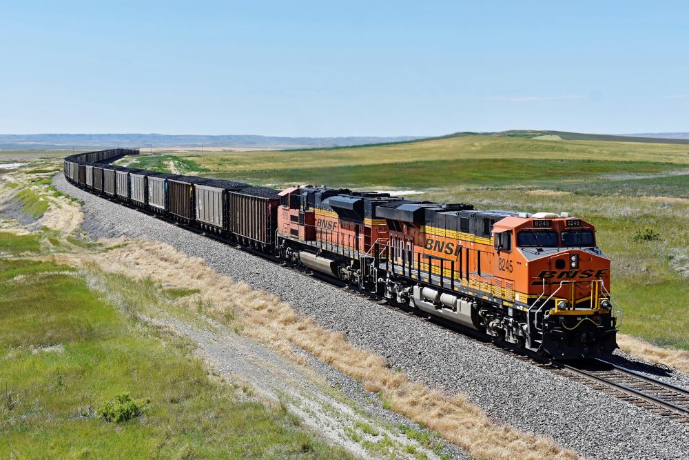 A BNSF railroad train hauling carloads of coal from the Powder River Basin of Montana and Wyoming travels east of Hardin, Montana, July 15, 2020.