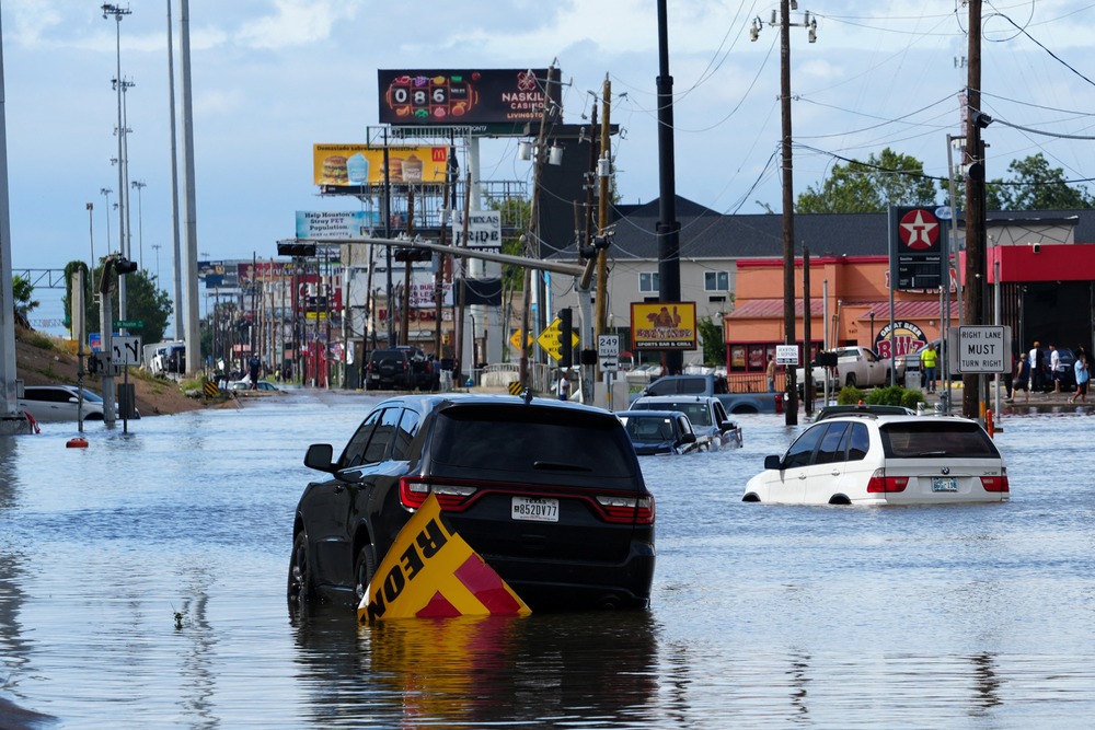 Hurricane Beryl Texas Landfall Major road flooded, floating cars.