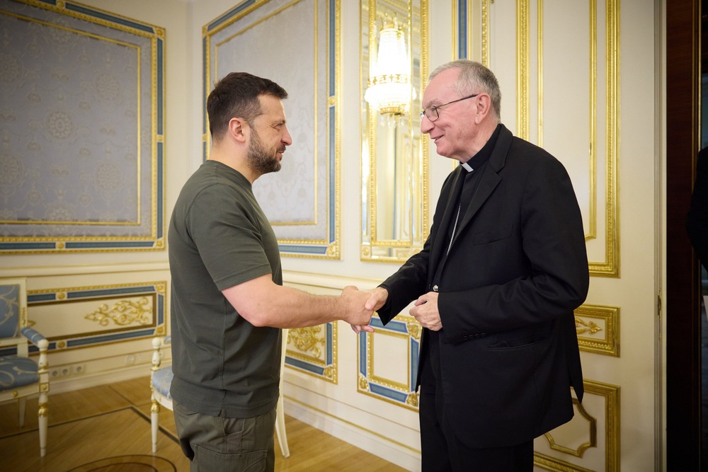 Cardinal Parolin Ukraine trip, July 19-24, 2024. Parolin and Zelenskyy shake hands.