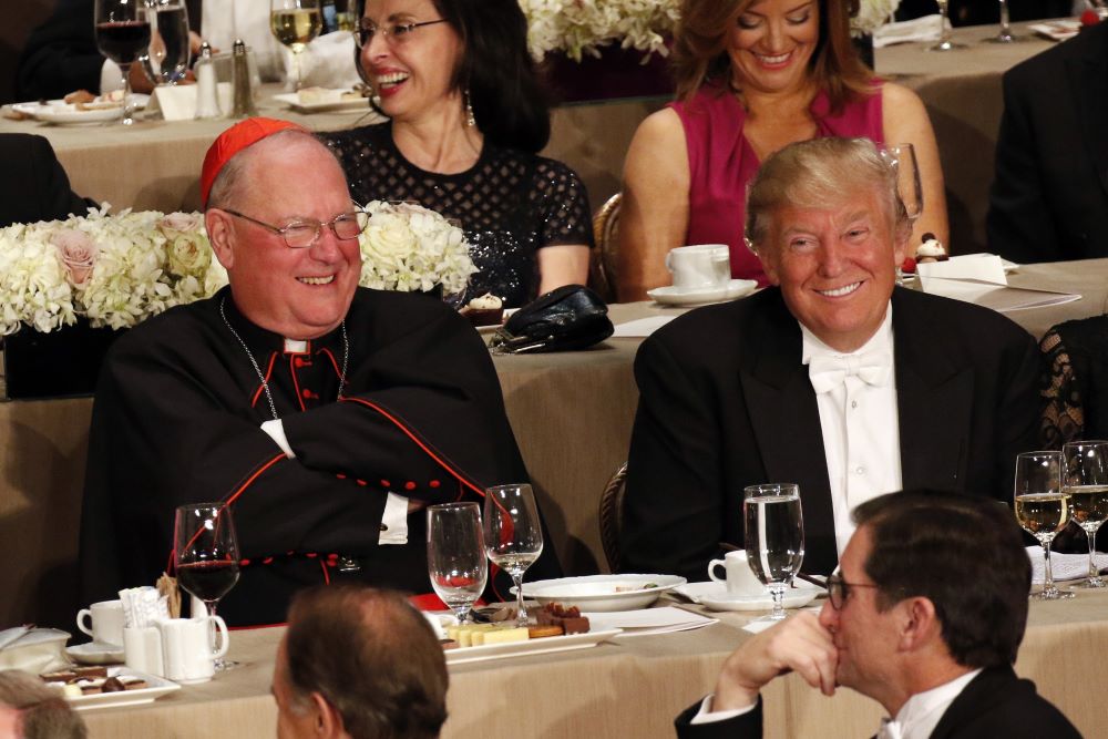 New York Cardinal Timothy Dolan and Donald Trump, then the Republicans' nominee for U.S. president, smile during the 71st annual Alfred E. Smith Memorial Foundation Dinner at the Waldorf Astoria hotel in New York City Oct. 20, 2016.