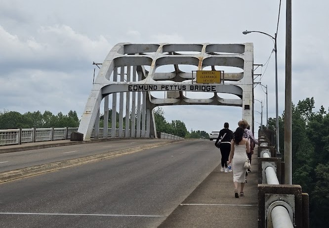 Graduate students in theology and ministry at Catholic Theological Union walk across the Edmund Pettus Bridge in Selma, Alabama, during a pilgrimage of sacred sites from the U.S. Civil Rights Movement. Graduate students in theology and ministry at Catholic Theological Union walk across the Edmund Pettus Bridge in Selma, Alabama, during a pilgrimage of sacred sites from the U.S. Civil Rights Movement.