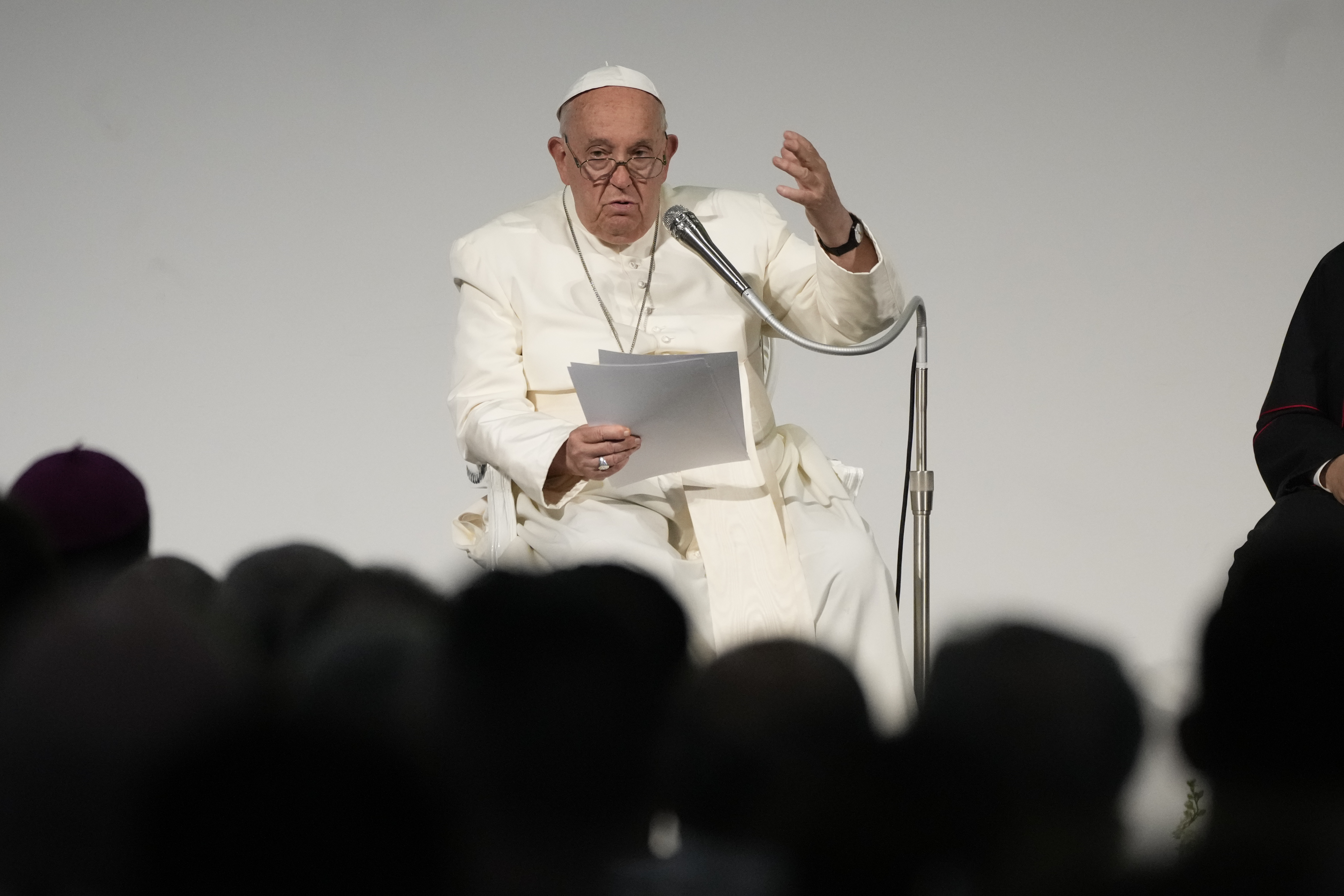 Pope Francis Pope Francis, seated, reads remarks